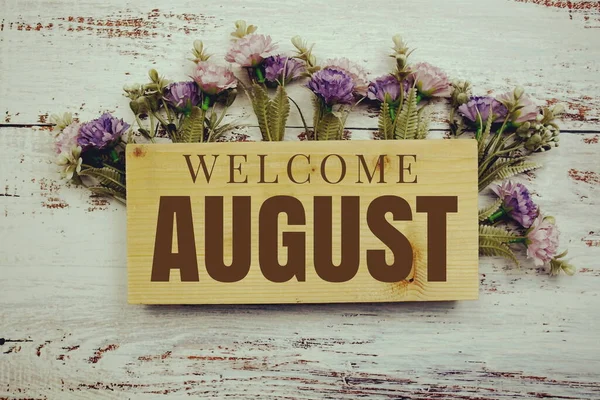 Welcome August Text Wooden Board Flowers Frame Wooden Background — Stock Photo, Image
