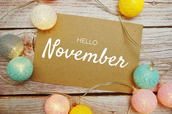 Hello November Karta Typografie Text Led Bavlněné Koule Dřevěném Pozadí — Stock fotografie