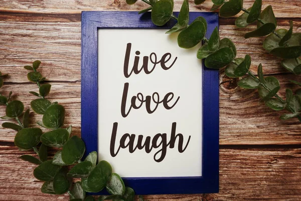 Home Sweet Home Written Blue Frame Green Leave Flat Lay — Stock Photo, Image