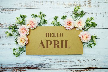 Merhaba Nisan tipografi metin tahtadan arka planda çiçek ile dekore