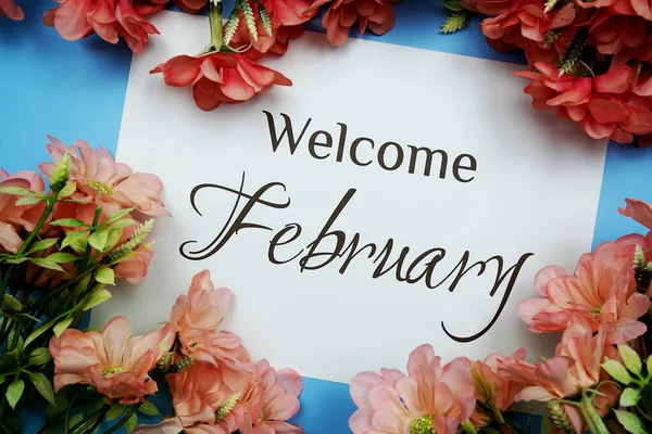 Welcome February Text Pink Flower Frame Blue Background — Stock Photo, Image