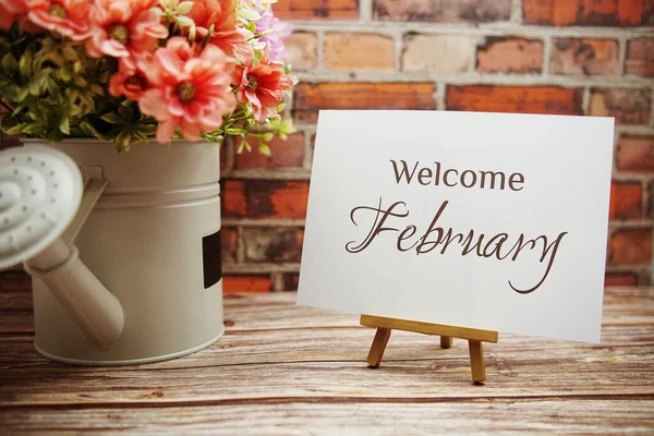 Welcome February Text Flower Bouquet Decoration Wooden Old Brick Wall — Stock Photo, Image