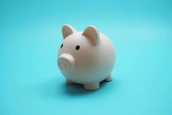 Piggy Bank Saving Finance Concept Blue Background Royalty Free Stock Photos