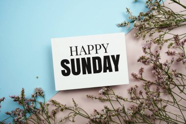 Mavi ve pembe arkaplanlı mutlu pazar mesajları