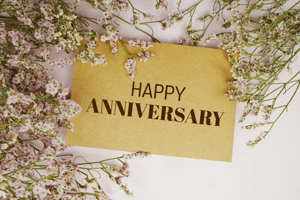 Happy Anniversary Text Message Flower Decoration Blue Background — стоковое фото