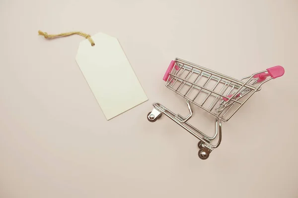 Price Tag Shopping Trolley Cart Pink Background — Fotografia de Stock