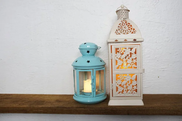 Lantern with LED candle light Home decoration accessories on wooden shelves