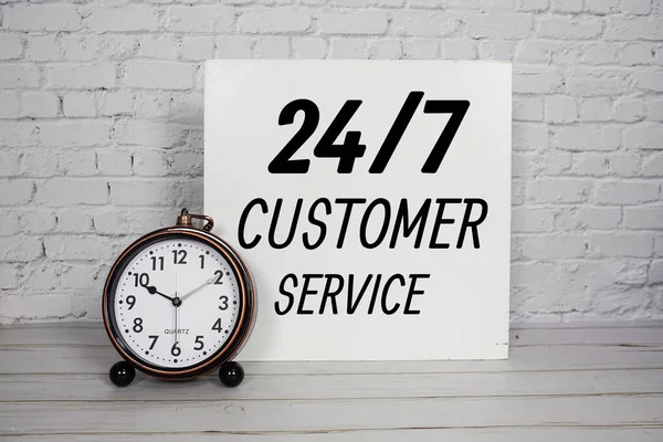 Customer Service Alphabet Letters Alarm Clock White Brick Wall Background — Stock Photo, Image