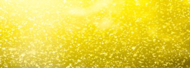 Soyut altın sarısı parıltılı şenlikli dramatik bokeh parıltılı altın tasarım kutlama arka plan panorama dokusu
