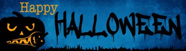 HALLOWEEN background banner wide panoramic panorama template -Silhouette of scary carved luminous cartoon pumpkins and isolated on dark blue texture