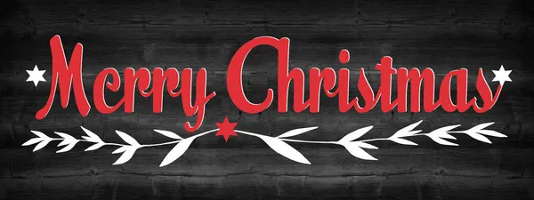 メリークリスマスお祝いの背景バナーパノラマグリーティングカード 素朴な黒い木の板の上の星の枝と手のレタリング木の壁のテクスチャ — ストック写真