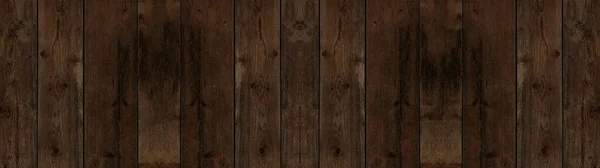 陈旧不堪的褐色风吹日晒的深色木地板墙板地板质感 木制背景横幅全景 — 图库照片