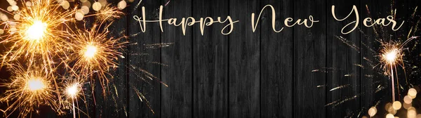 Ευτυχισμένο Νέο Έτος Σιλβέστερ Φόντο Πανόραμα Long Sparklers Και Bokeh — Φωτογραφία Αρχείου