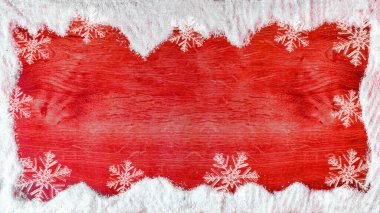 Noel / Kış arkaplan şablonu - Kar taneleri ile kardan yapılmış çerçeve ve kırmızı ahşap dokuda buz kristalleri, metin için boşluk ile üst görünüm