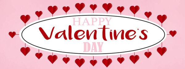 С Днем Святого Валентина фоновый шаблон баннер - Белая наклейка в форме эллипса в окружении висит красной бумаги сердца изолированы на розовой текстуре