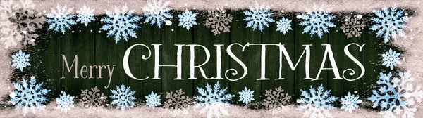 クリスマスの雪の冬の背景バナーパノラマ 暗い木製のテクスチャに雪のフレークと氷の結晶で作られたフレーム テキストのためのスペースでトップビュー — ストック写真