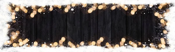 降临节 圣诞节背景横幅全景模板 框架由雪片和黑色灰色木制纹理的Bokeh灯制成 顶部有文字空间 — 图库照片