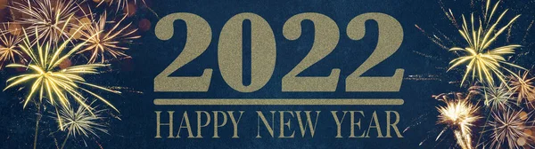 HAPPY NEW YEAR 2022 - Festive silvester New Year\'s Eve Party background panorama greeting card banner long - Golden fireworks in the dark blue night