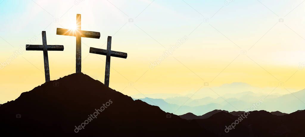 Easter background banner panorama religious greeting card Crucifixion and Resurrection. Three crosses of Golgotha by sunset.