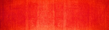 Abstract orange red colored rustic concrete wall texture background banner panorama with vertical broomstick lines