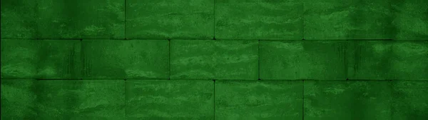 Abstract green colored concrete cement stone brick wall texture background -Long panorama pattern
