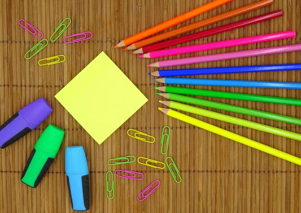 School Office Supplies Wooden Background Crayons Fluorescent Markers Paper Clips — Stock Photo, Image