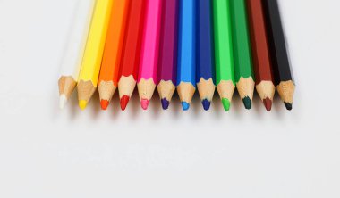 Colored pencils in rainbow colors. Copy space.