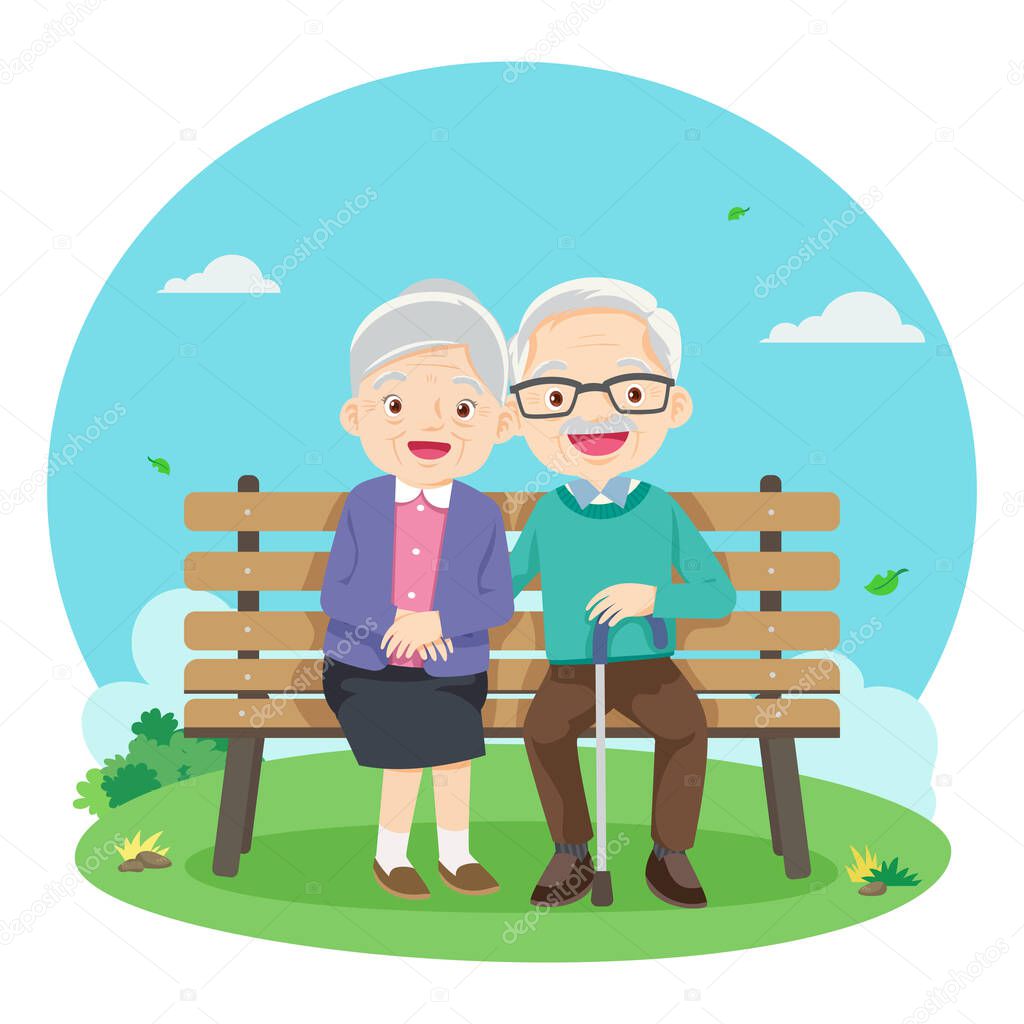 Happy senior people lifestyle concept. Smiling aged mature couple relaxing in park, sitting on bench