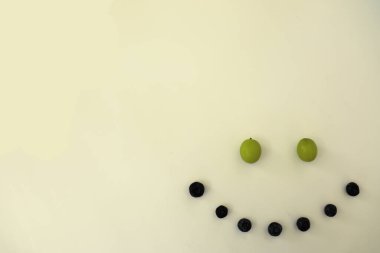 Smile Face of Grapes and Blueberries