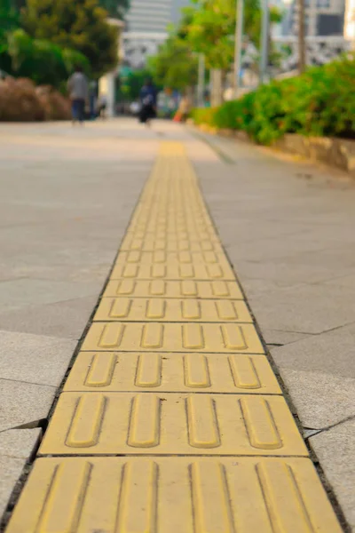 Pictures of A Special Line Near the Street to Help Blind People Cross the Street