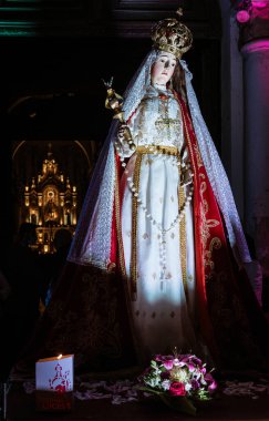 Cuenca, Ecuador, Dec 7, 2021 - The Traveling Child statue is brought out from the church for traditional Christmas Eve parade