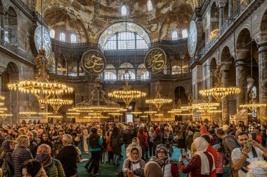 Istanbul, Turkey - April 29, 2022 - Tourists and Pilgrims in the Hagia Sophia Mosque. High quality photo