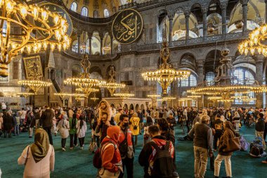 Istanbul, Turkey - April 29, 2022 - Tourists and Pilgrims in the Hagia Sophia Mosque. High quality photo