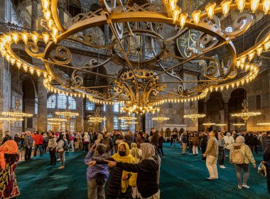 Istanbul, Turkey - April 29, 2022 - Tourists and Pilgrims in the Hagia Sophia Mosque. High quality photo