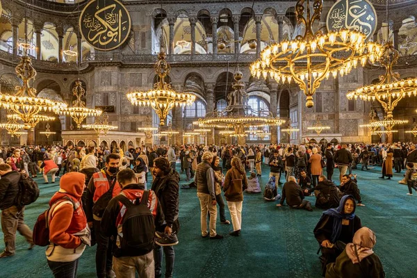 Istanbul, Turkey - April 29, 2022 - Tourists and Pilgrims in the Hagia Sophia Mosque. High quality photo