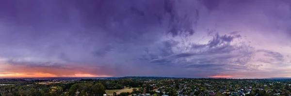 Stormy Rain Clouds Afterglow Sunset Glowing Purple Blue Orange Aerial — Stock Photo, Image