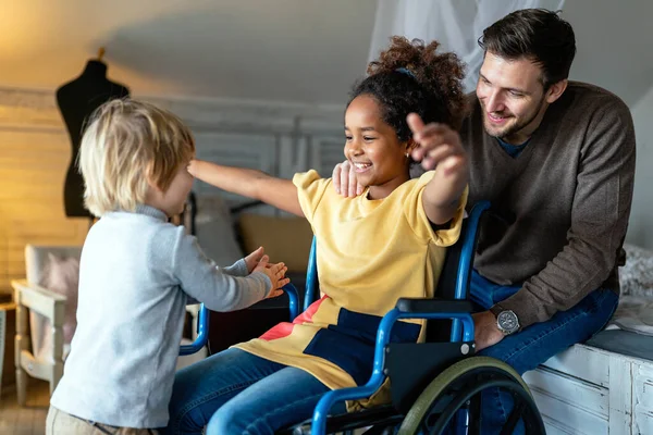 Happy Multiethnic Loving Family Smiling Little Girl Disability Wheelchair Home — Stock Photo, Image