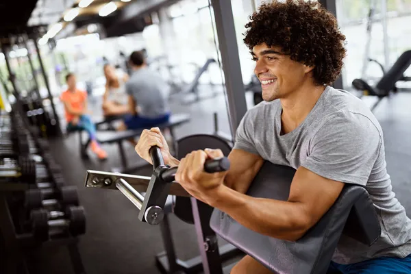 Man Working Out Gym Fitness Machine — Stock Photo, Image