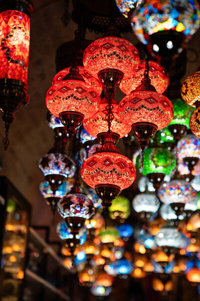 Beautiful oriental colorful glass hanging lamps or lanterns in turkish bazaar