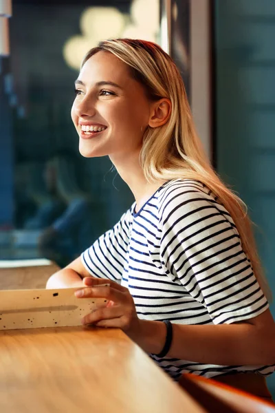 Portrait of happy woman smiling with perfect smile and looking at camera. People healthy lifesytle concept.