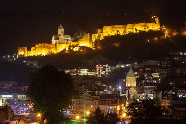 Tbilisi, Georgia - 6 November, 2021: Night view of old Tbilisi. Narikala. Travel
