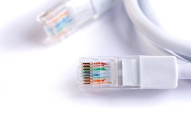 An image of computer network cable on white background. Technology
