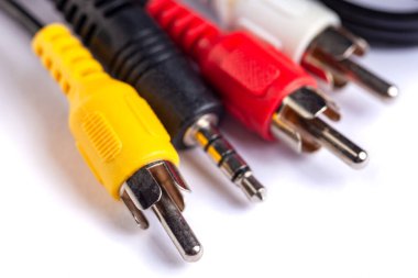 Electric plug of television and audio-video power supply on white backgrund. RGB cabel
