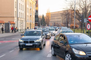 Krakow, Poland - 13 March, 2022: Street with historical houses in Krakow old town, Poland