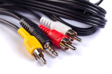 Electric plug of television and audio-video power supply on white backgrund. RGB cabel