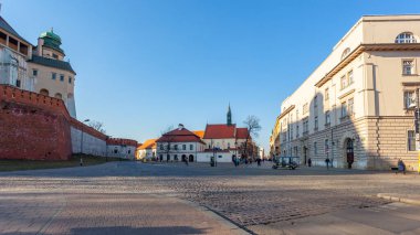 Krakow, Poland - 14 March, 2022: A cross on the square in front of the Church of St. Giles in memory of the Polish victims in Katyn in 1940. Travel