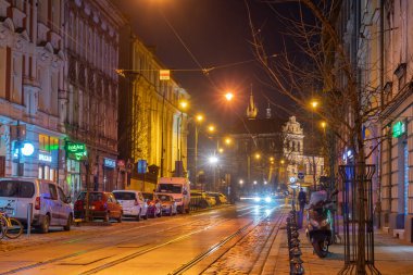Krakow, Poland - 14 March, 2022: Night view of Krakow streets. Travel