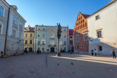 Krakow, Poland - 14 March, 2022: The monument of Polish Jesuit - Skarga Piotr on Saint Mary Magdalene square. Travel
