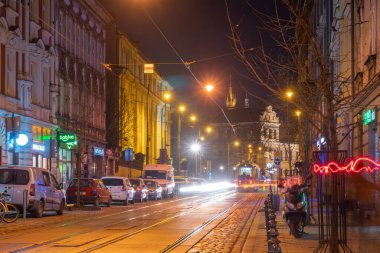 Krakow, Poland - 14 March, 2022: Night view of Krakow streets. Travel