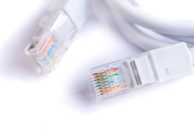 An image of computer network cable on white background. Technology